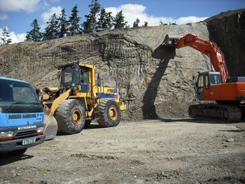  A truck collecting stone material