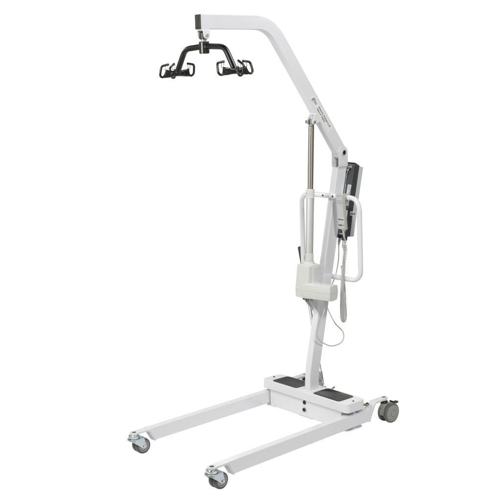 A white, mobile electric patient lift on wheels with a spreader bar and a hand control pendant.