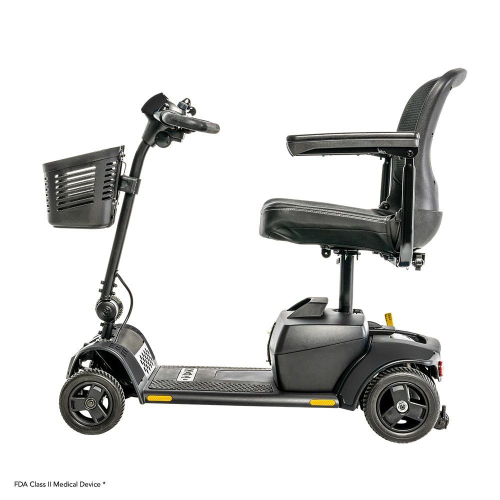 A four-wheeled black mobility scooter with a mesh back seat and front storage basket against a white background.