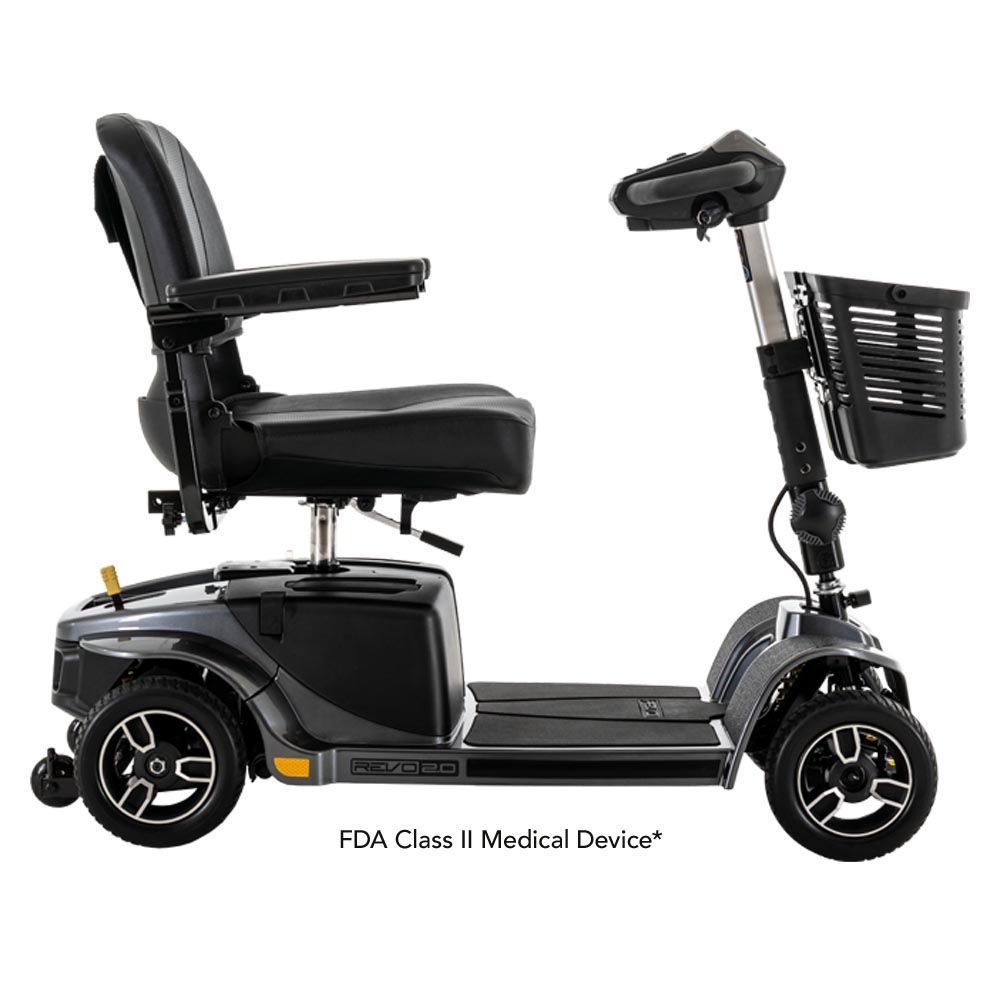 A black four-wheeled Pride mobility scooter with a front storage basket, side armrests, and a black padded seat.