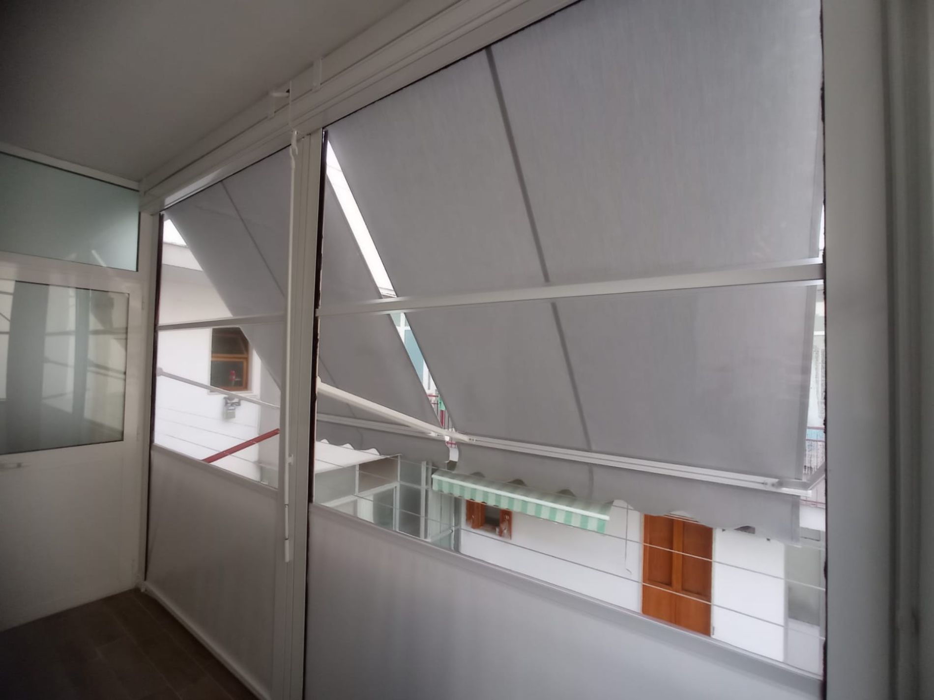 tende antivento apribili