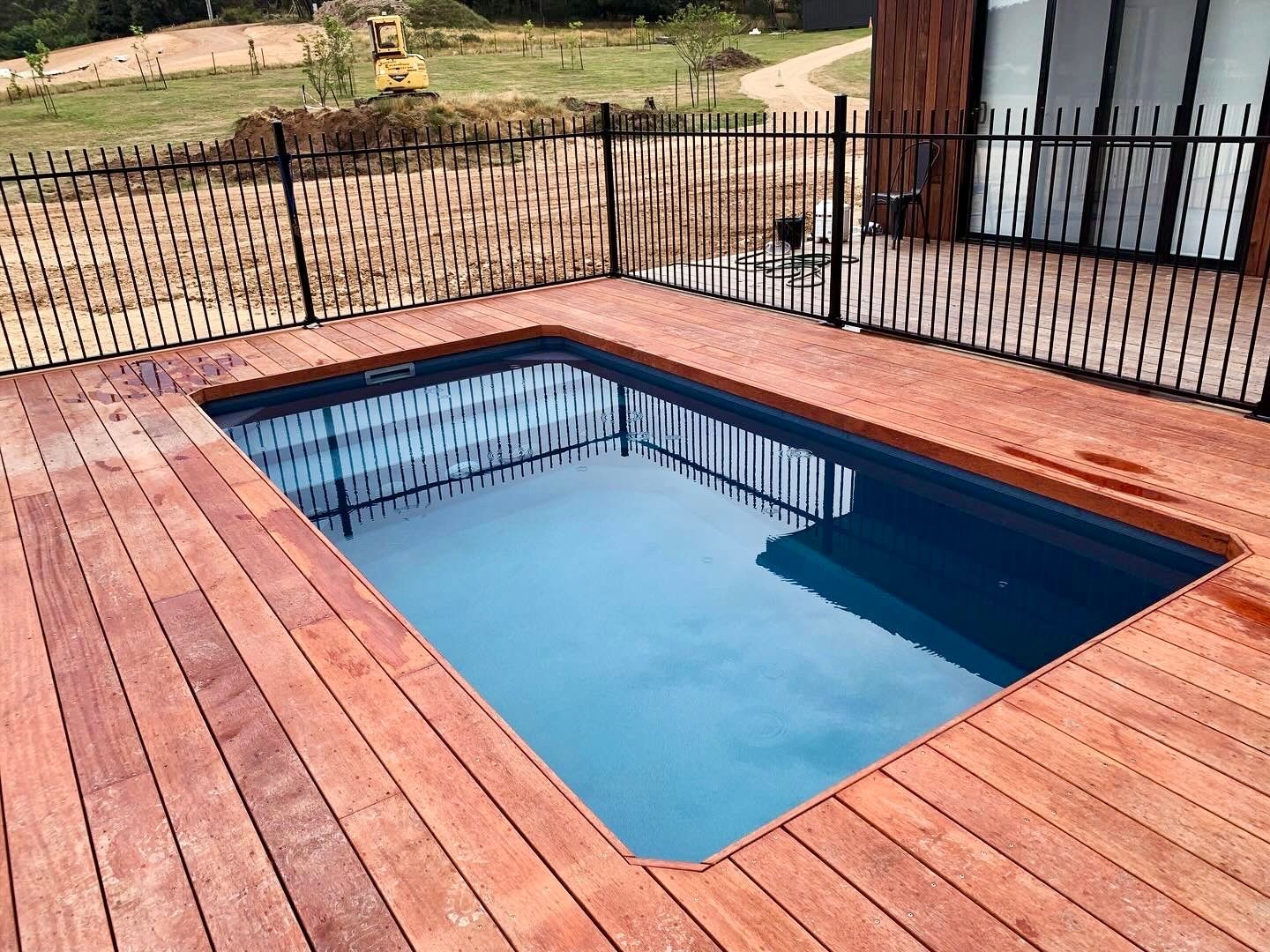 A Plunge pool surrounded by a new wooden deck
