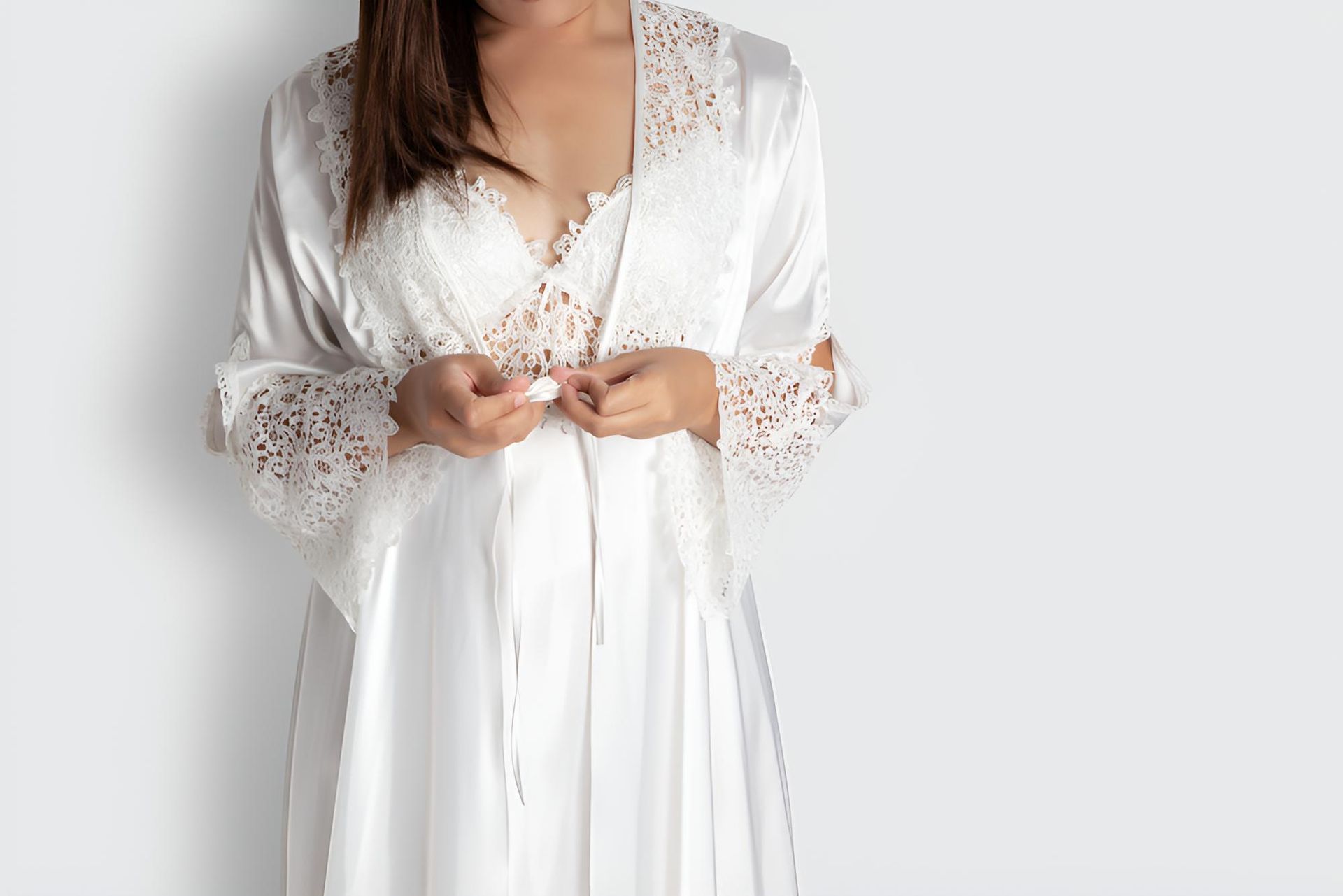 Woman is Wearing a White Robe and Lace Top — Daze & Nites Lingerie in Buderim, QLD