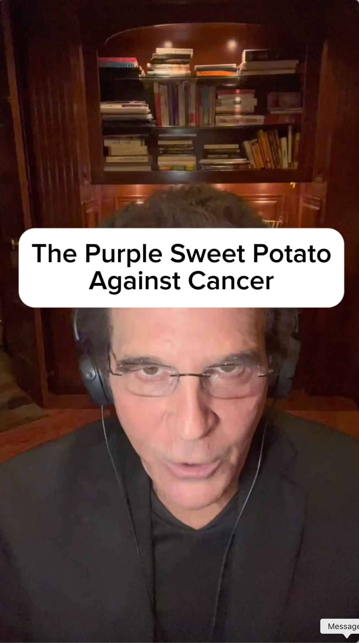 A man wearing headphones and glasses is talking about the purple sweet potato against cancer.