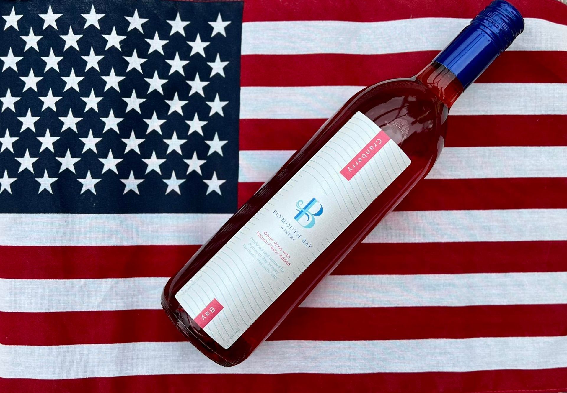 Bottle of pink wine on American flag.