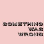 A pink background with the words `` something was wrong '' written on it.