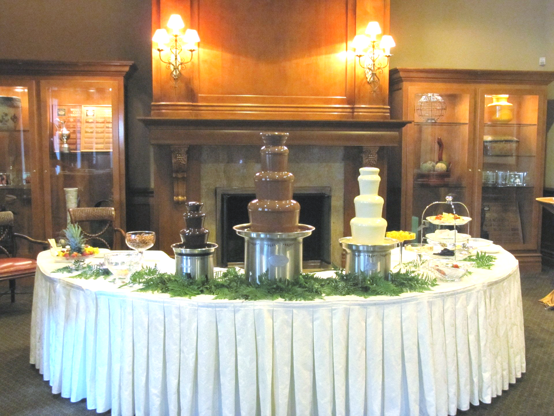 A table with a chocolate fountain on it