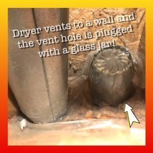 Dryer vents to a wall and the vent hole is plugged with a glass jar