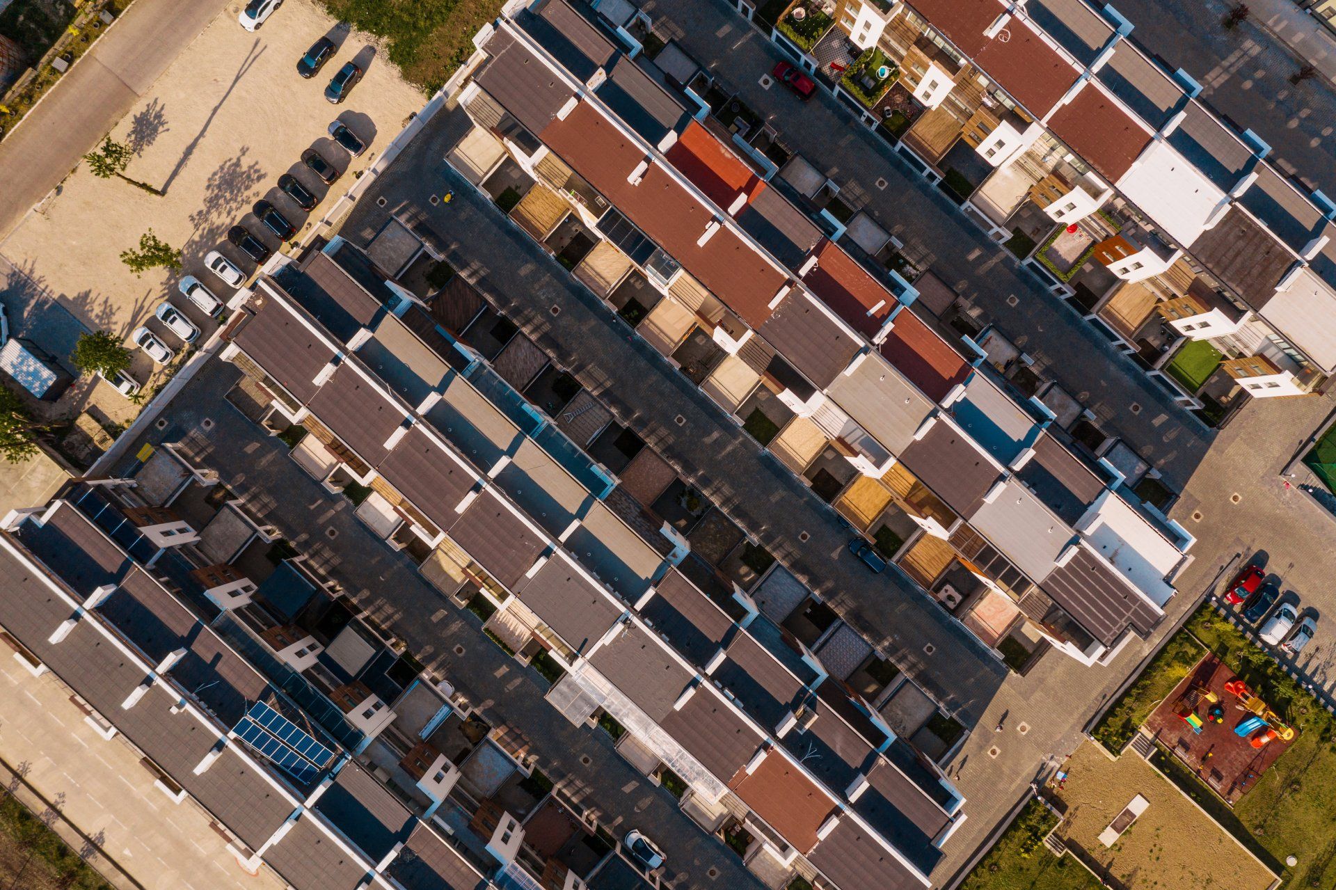 An aerial view of a row of houses in a residential area
