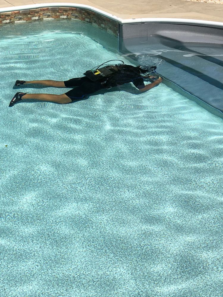 Person in Scuba Gear Underwater, Near Pool Steps — Ballina Leak Detection & Swimming Pool Repairs in Ballina, NSW