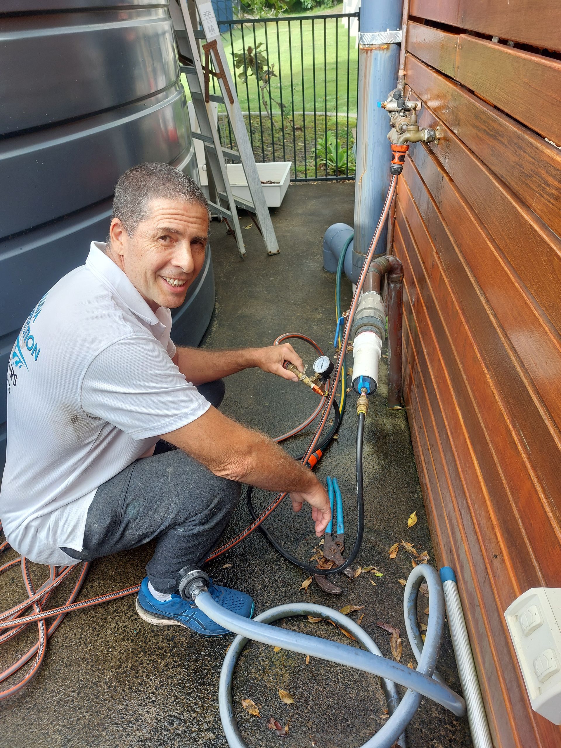Man in Wetsuit by Pool With Equipment — Ballina Leak Detection & Swimming Pool Repairs in Ballina, NSW