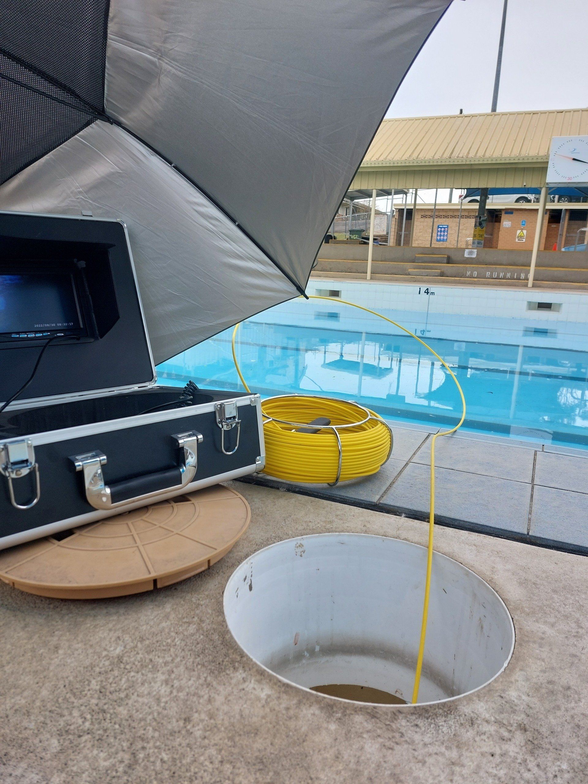 Equipment Set up Near a Pool. a Camera — Ballina Leak Detection & Swimming Pool Repairs in Ballina, NSW