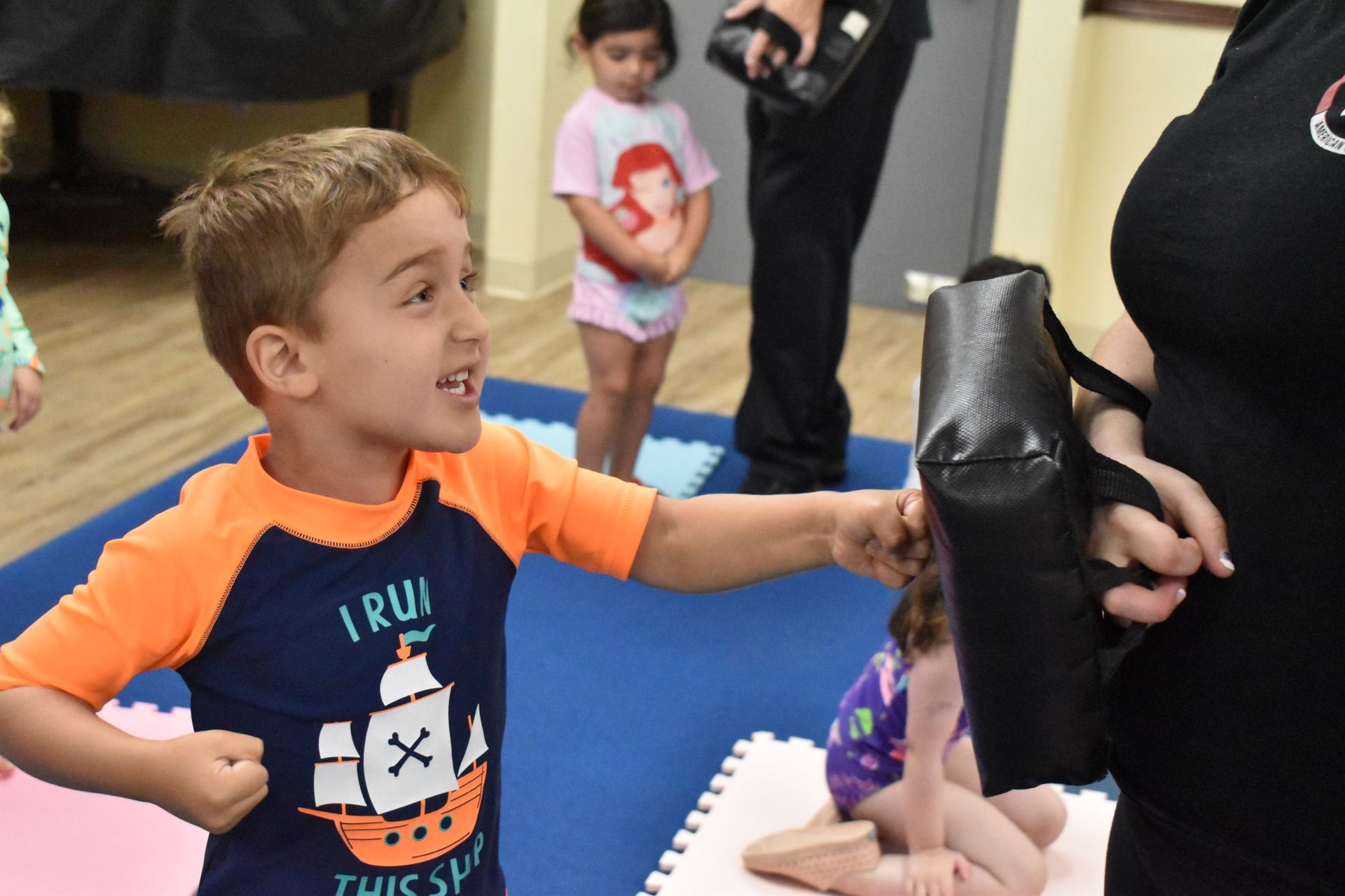 A young boy doing karate