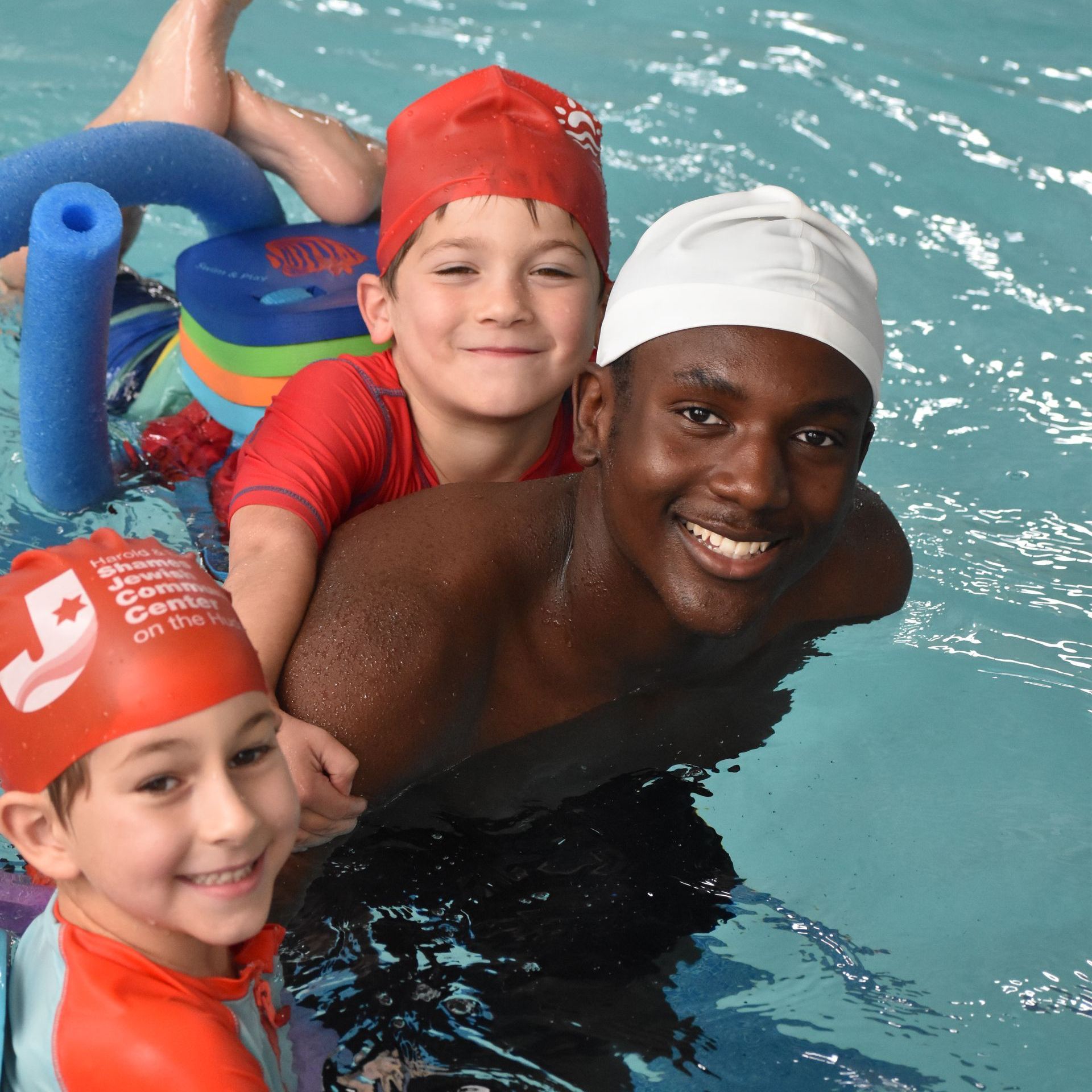a swim lesson with two campers