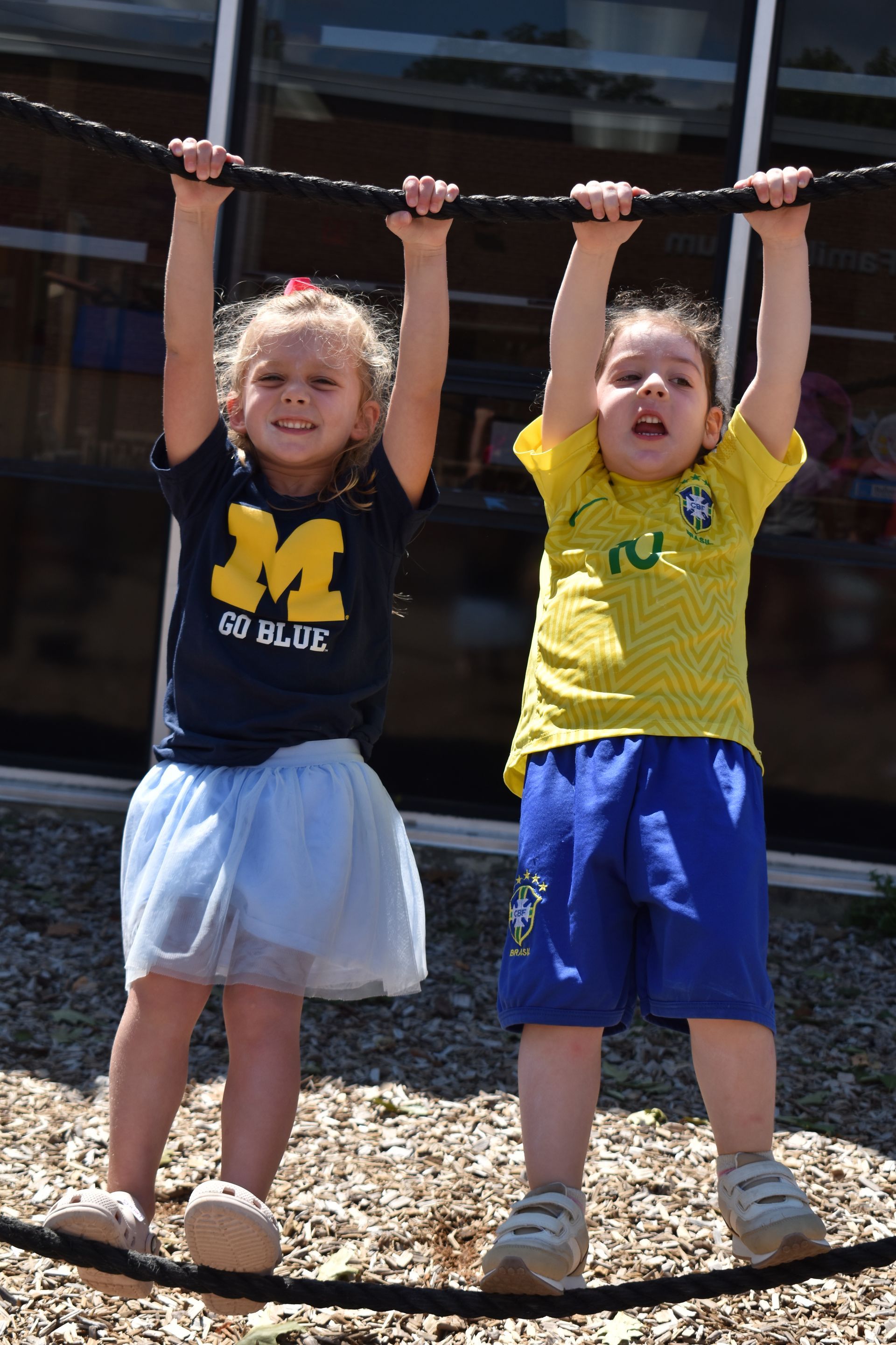 two little girls on a playground
