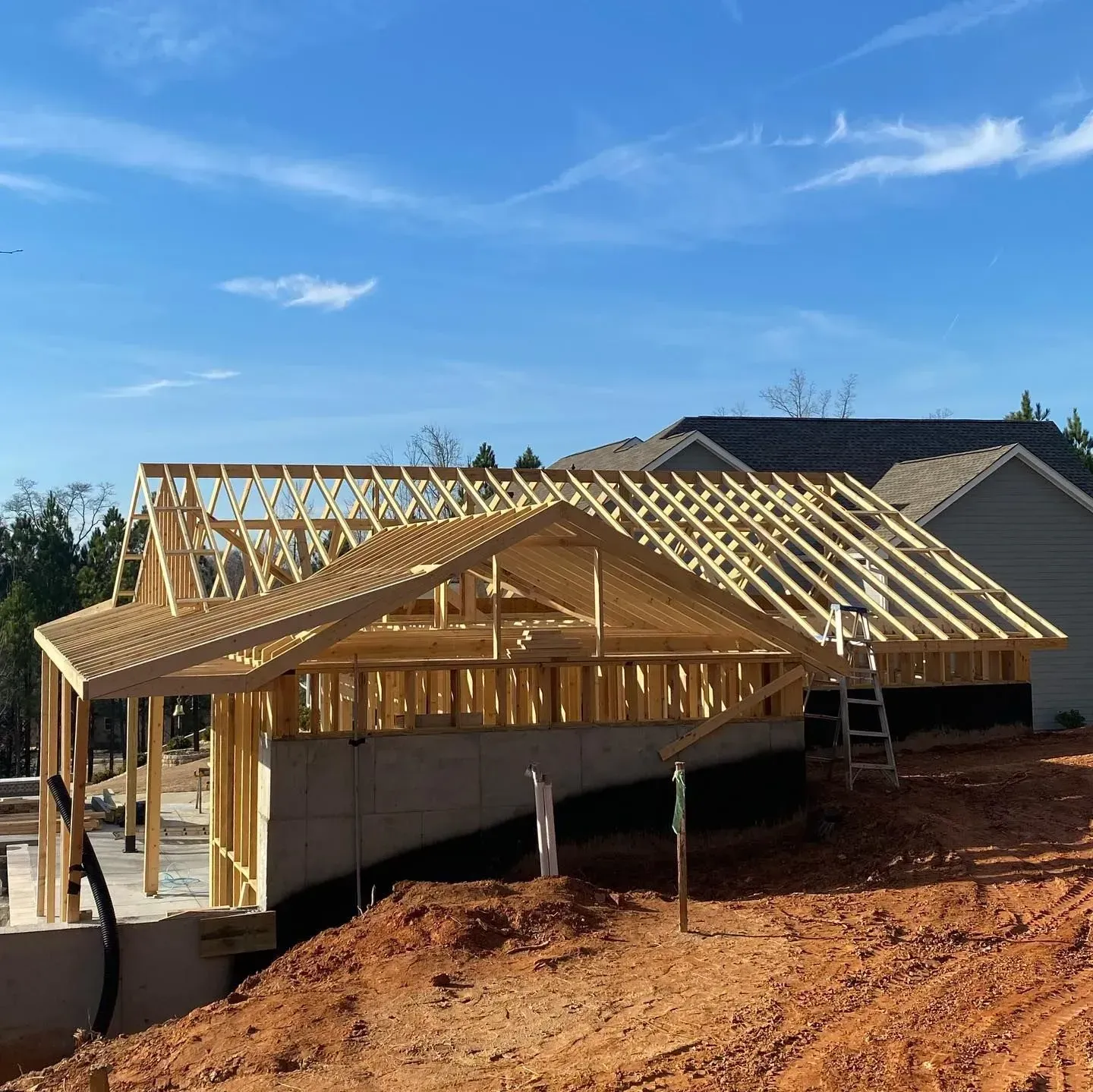 A house that is being built with wooden beams