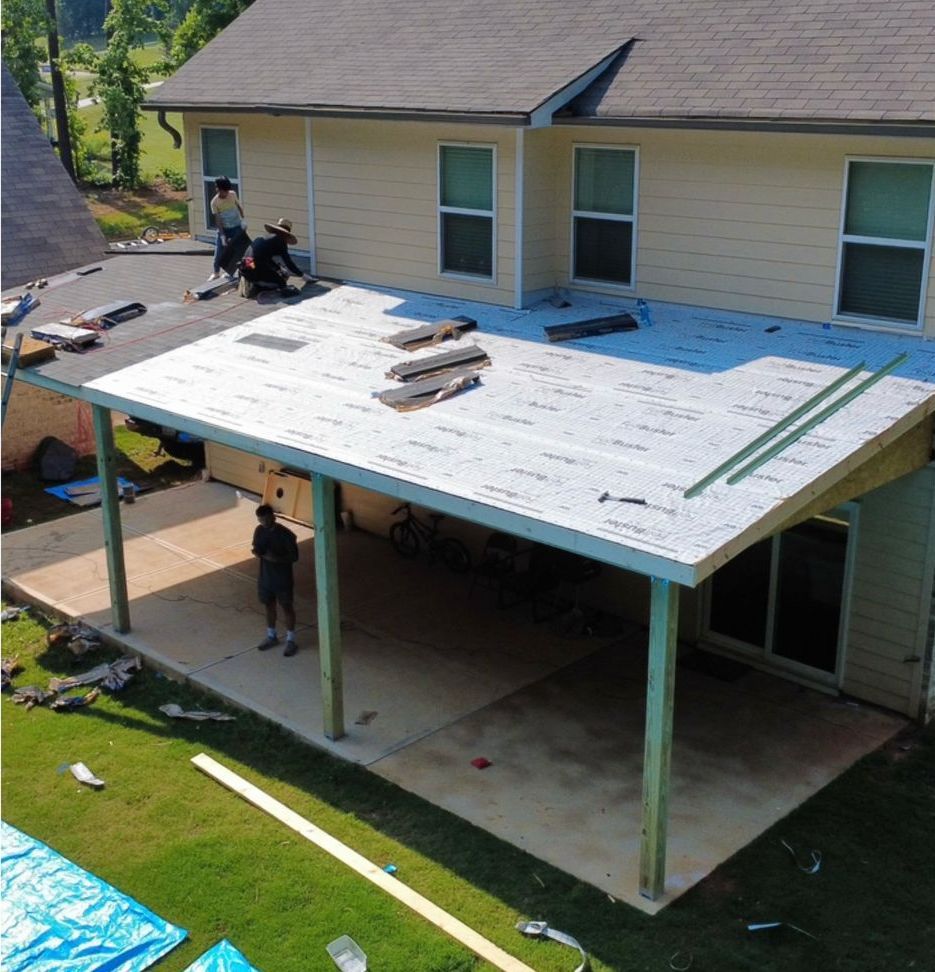 An aerial view of a house that is being remodeled
