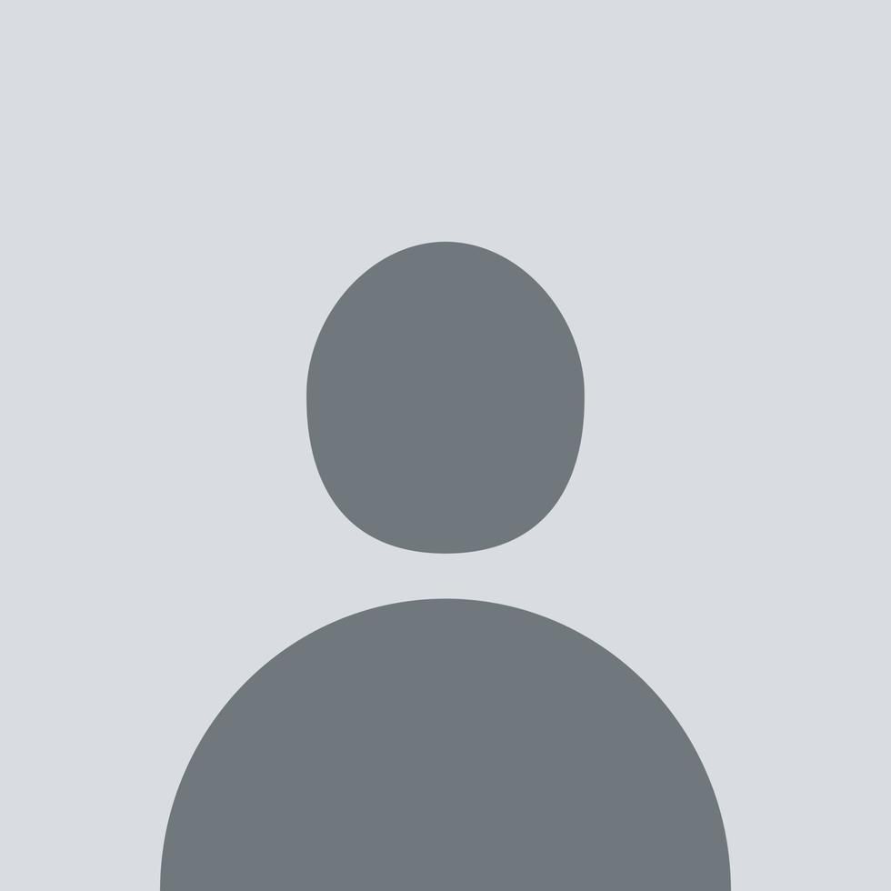 A silhouette of a person with a circle in the middle on a gray background.