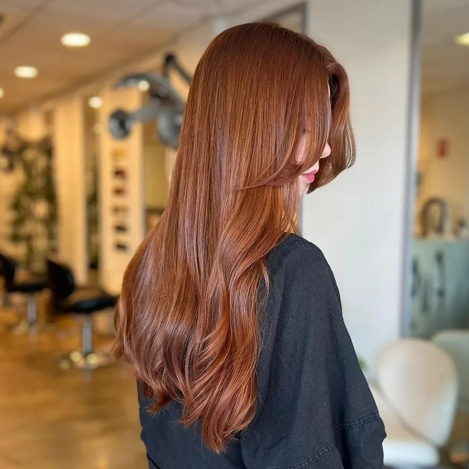 Woman getting her hair dyed — Specialised Hair Salon in Darwin