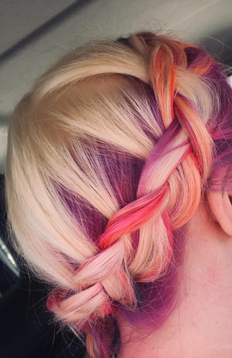 A Woman With Blonde And Purple Hair Is Wearing A Braided Hairstyle — Fuse Hair & Beauty In Darwin City, NT