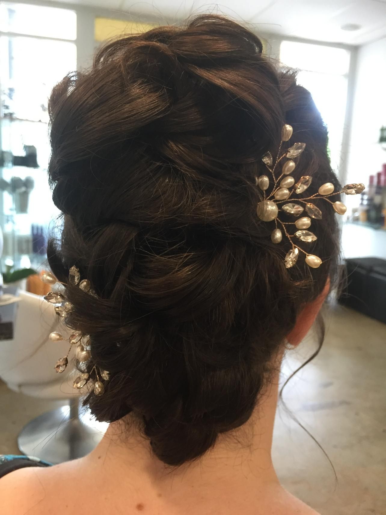 The Back Of A Woman 's Head With A Bun And Pearls In Her Hair — Fuse Hair & Beauty In Darwin City, NT
