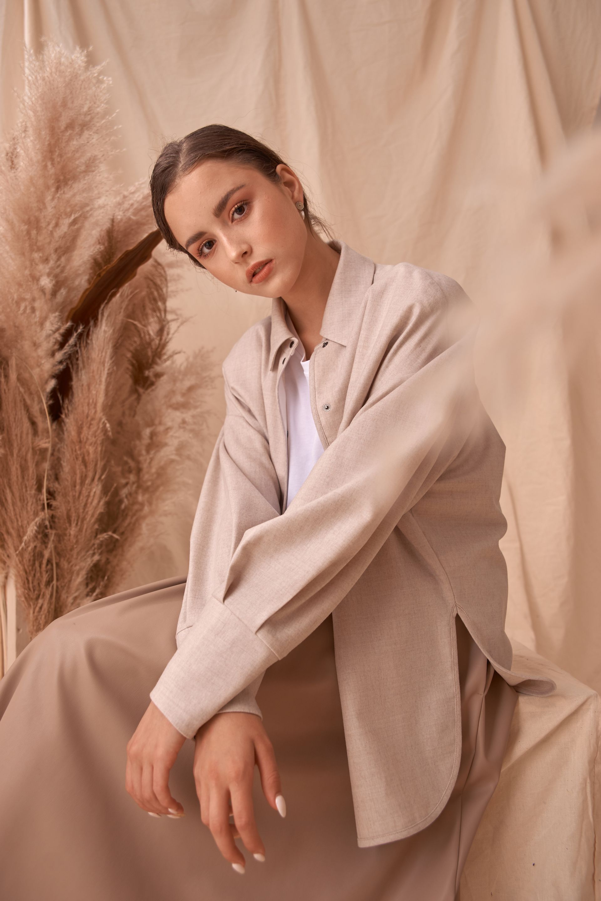 A Girl Model Wearing Beige Long Sleeve