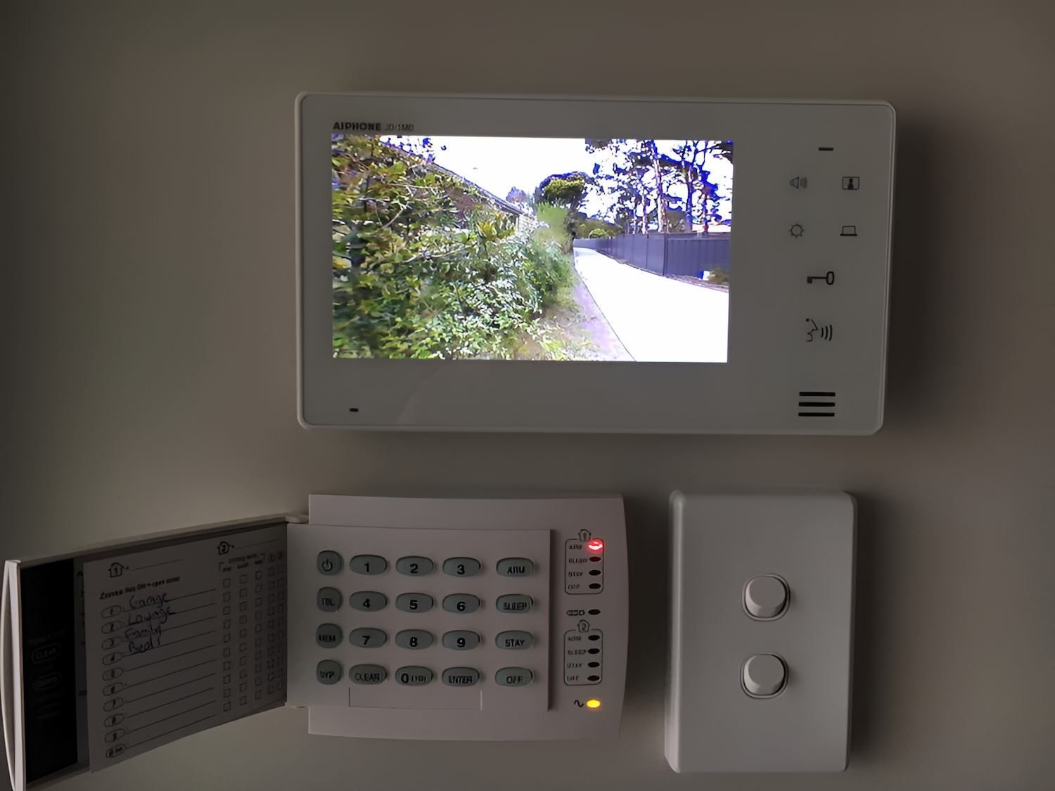 A Security System With a Monitor and a Keypad on the Wall — Adept Security In Thirroul, NSW