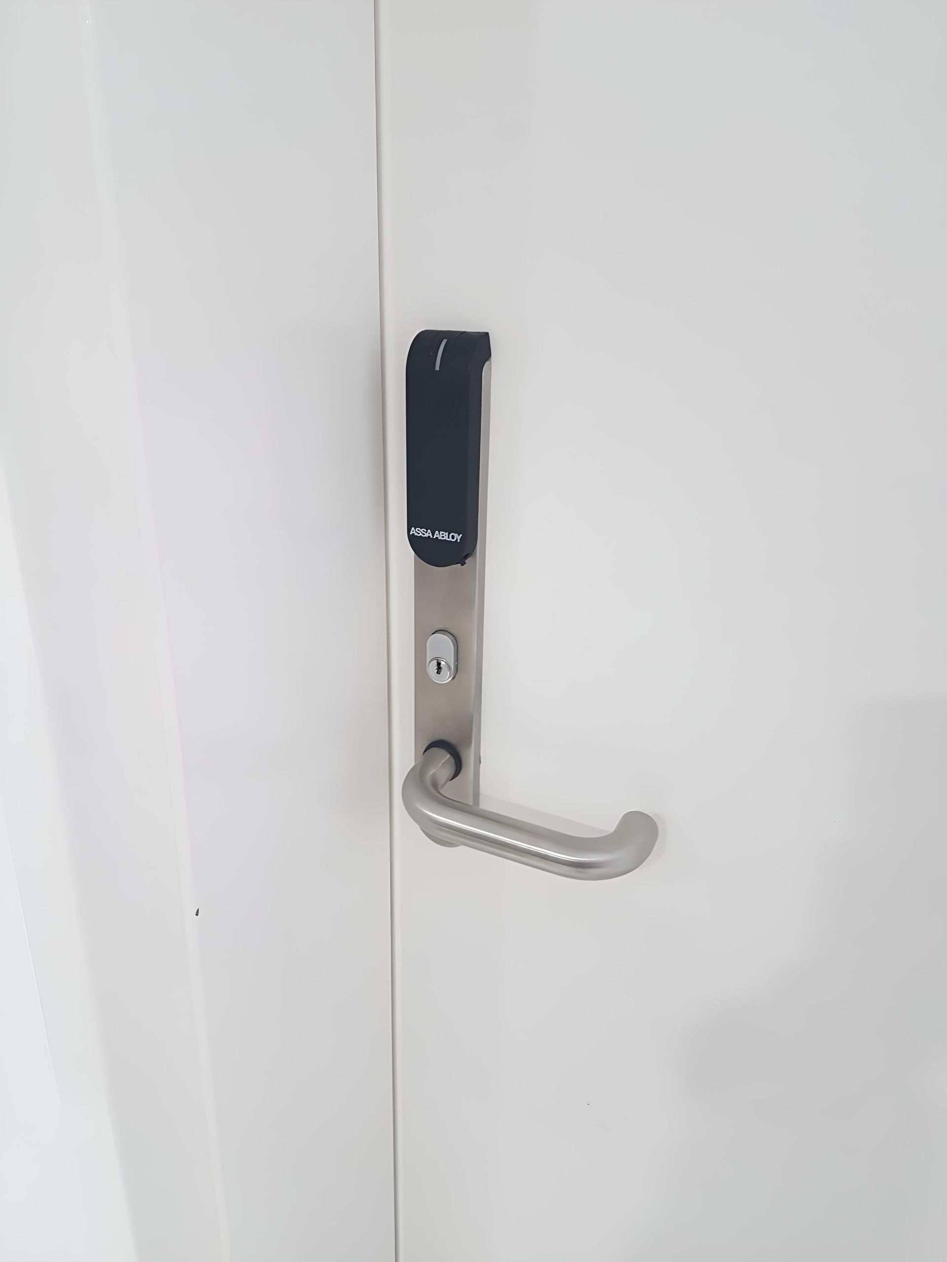 A Close Up of a Door With a Keypad on It — Adept Security In Oak Flats, NSW