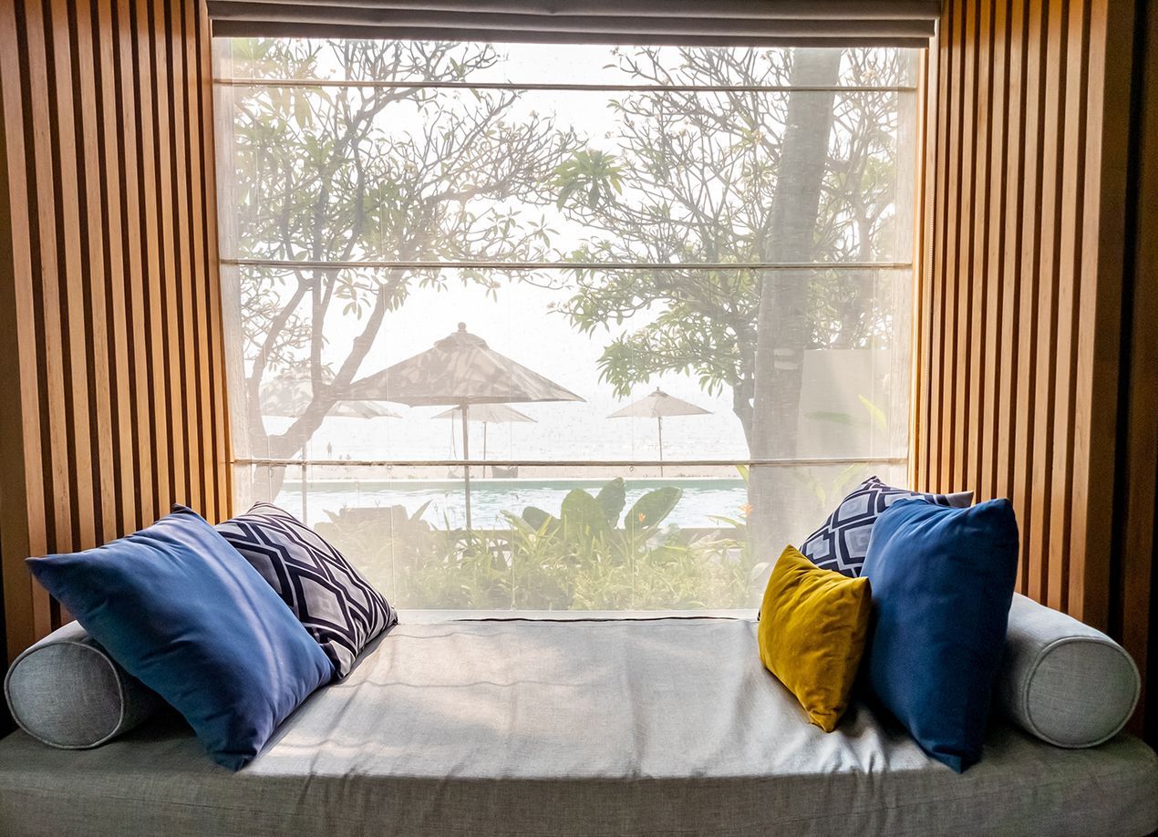 day bed pillows blur background view