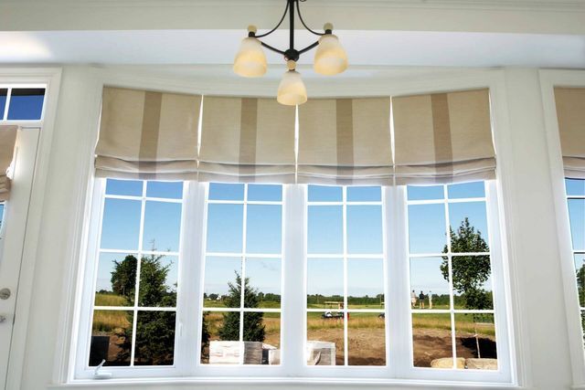 white roller blinds curtain glass window