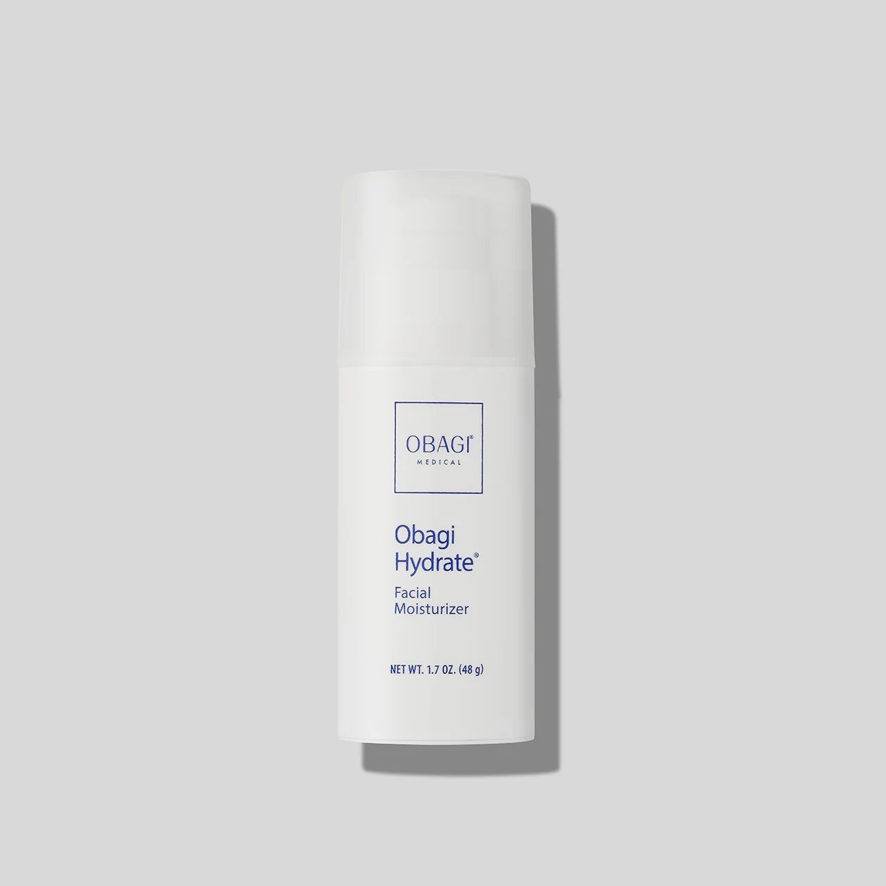 A tube of Obagi tretinoin cream is sitting on a white surface.