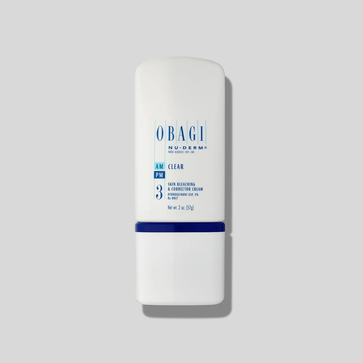 A white bottle of Obagi skincare product is sitting on a white surface.