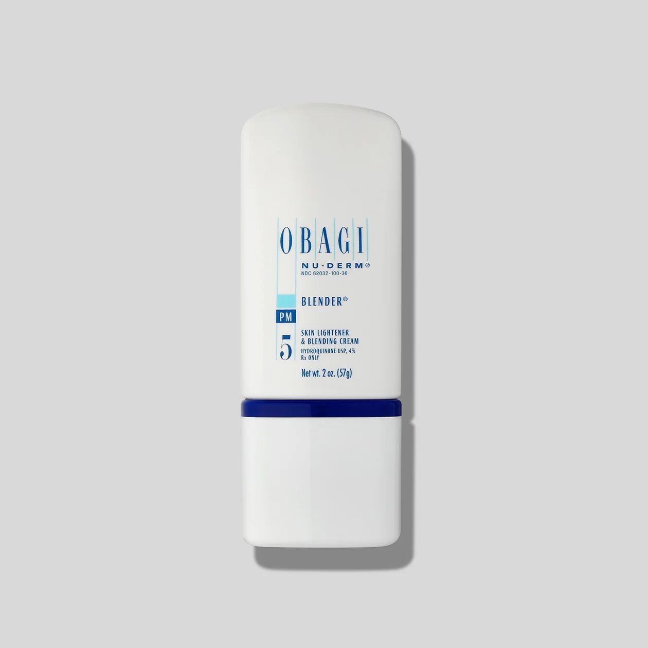 A white bottle of Obagi skincare product is sitting on a white surface.