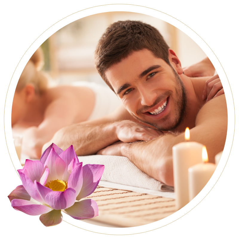 a man is smiling while getting a massage at a spa