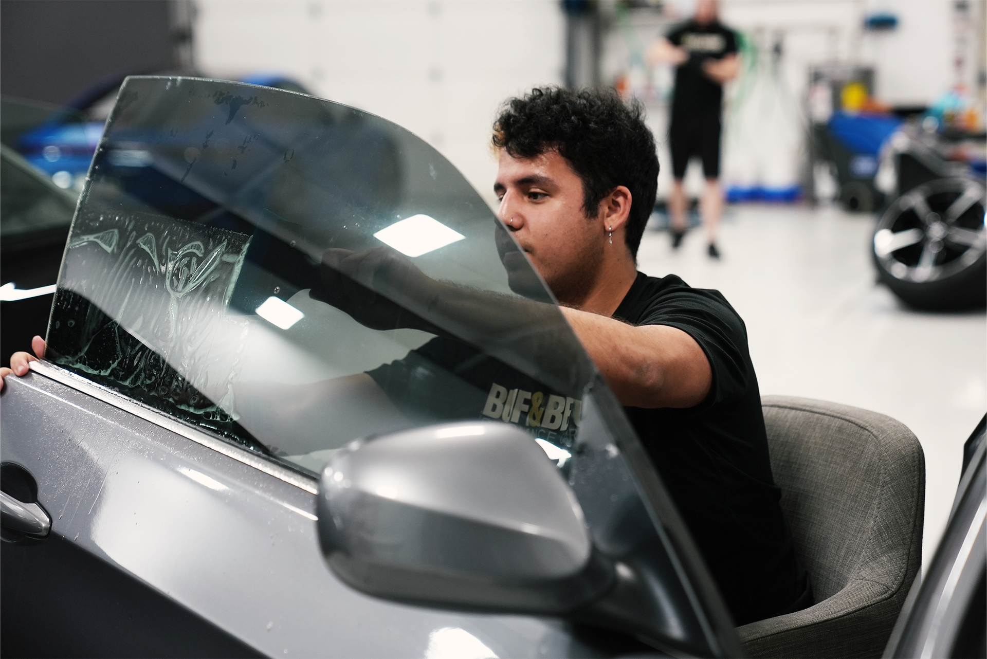 Window tint installation at A Buff and Beyond