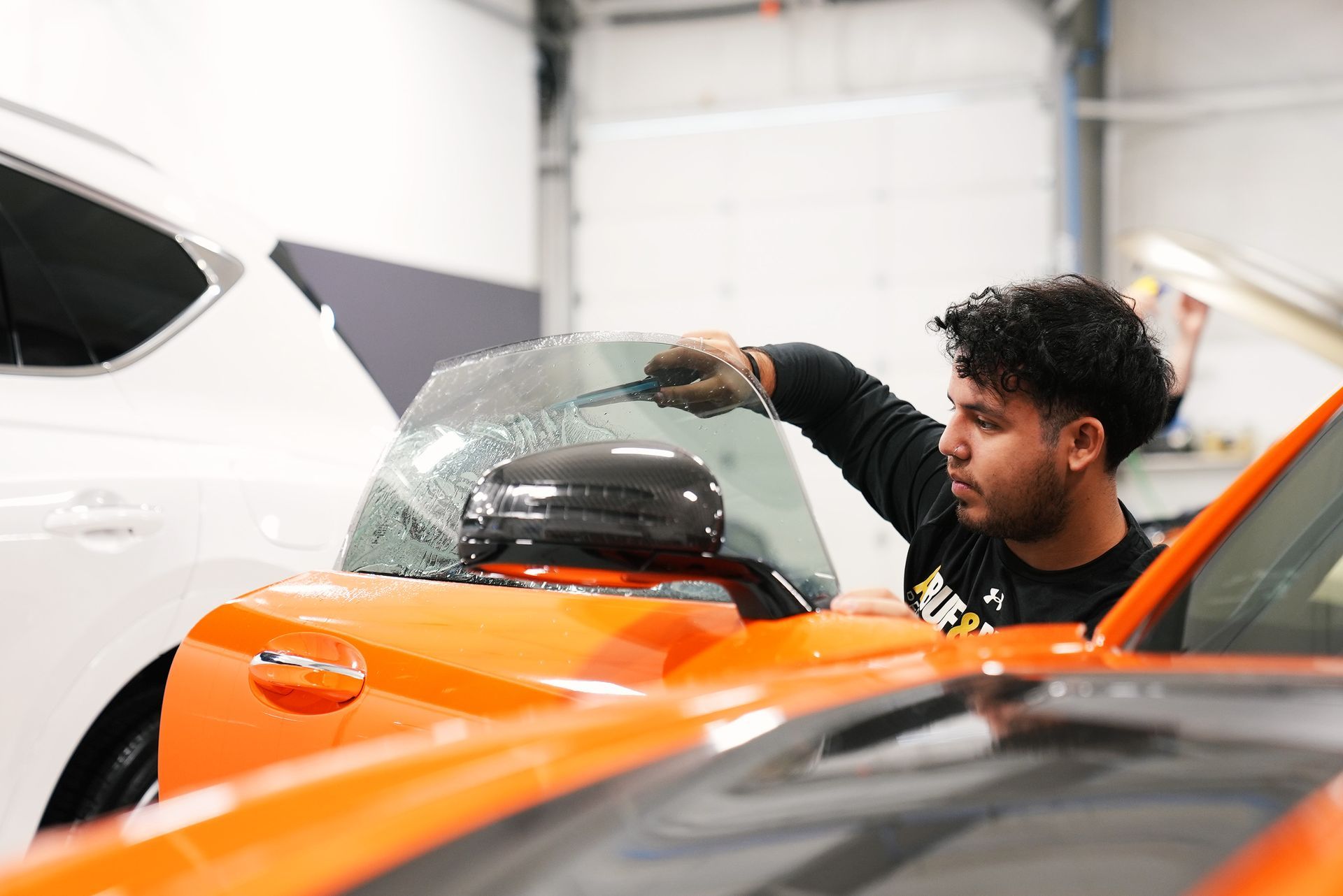 Window tint application at A Buff and Beyond