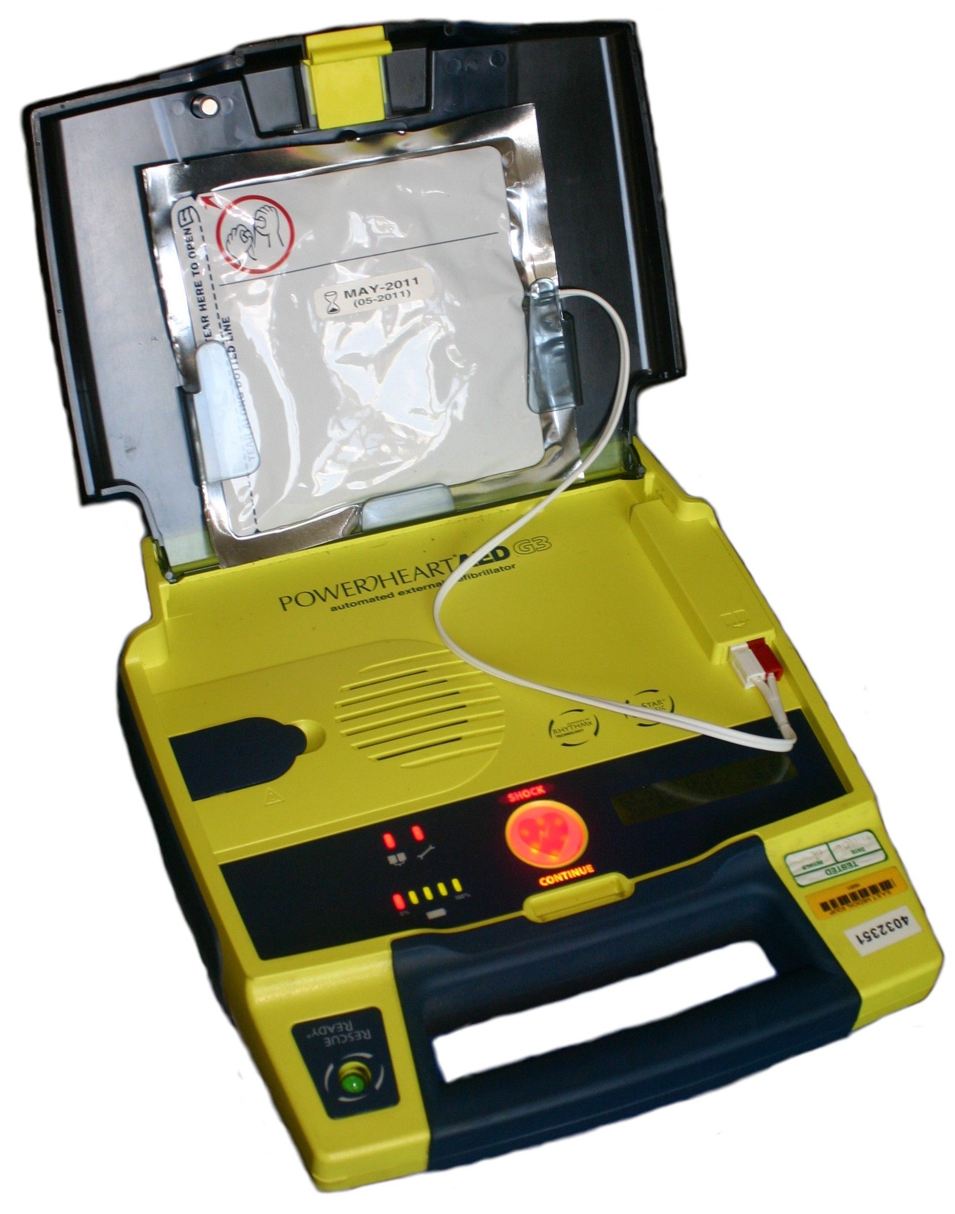 A yellow and black defibrillator with the cover open