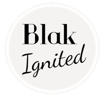 A black and white circle with the words Blak Ignited on it.