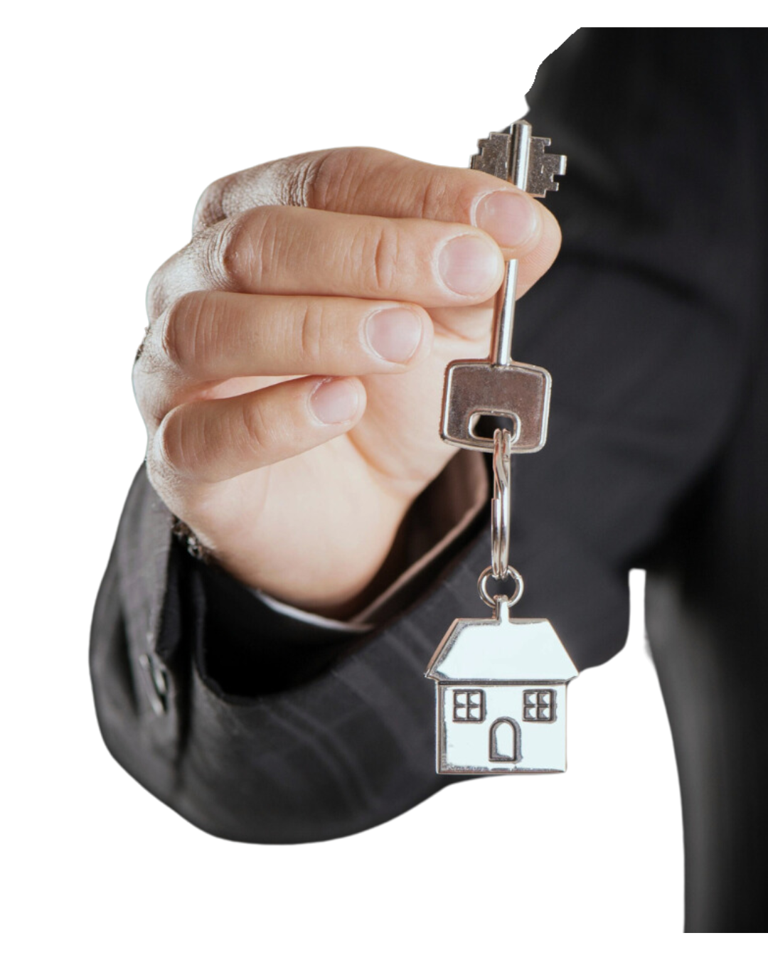 A man in a suit is holding a house key