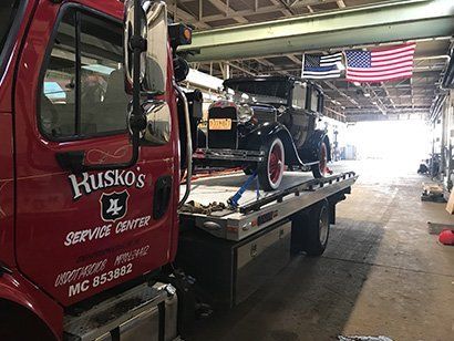 Vintage Car on a Tow Truck — Dearborn, MI — Rusko’s Service Center