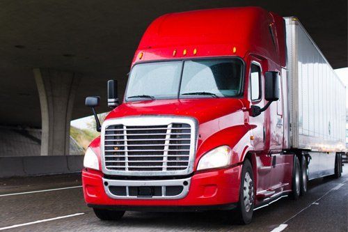 Red Truck On Highway — Dearborn, MI — Rusko’s Service Center