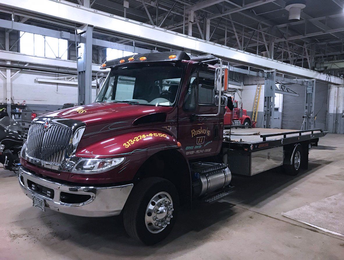 Rusko's Red Flatbed Tow Truck — Dearborn, MI — Rusko’s Service Center