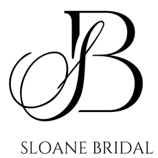 The blissful bridal logo has a blue flower on it.