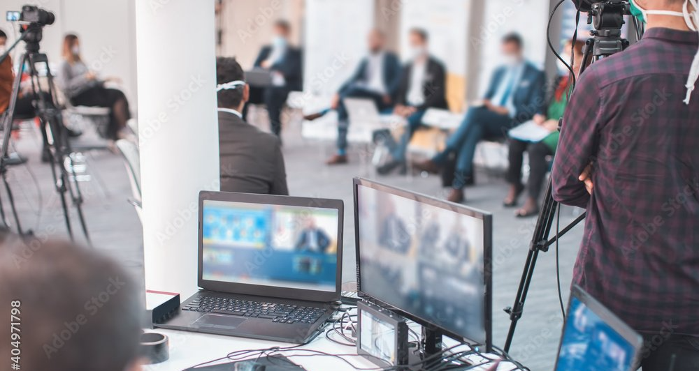 A group of business people taking part in a virtual conference