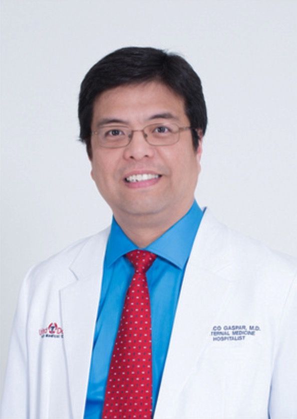Dr. Enrico Gaspar - male doctor in white coat
