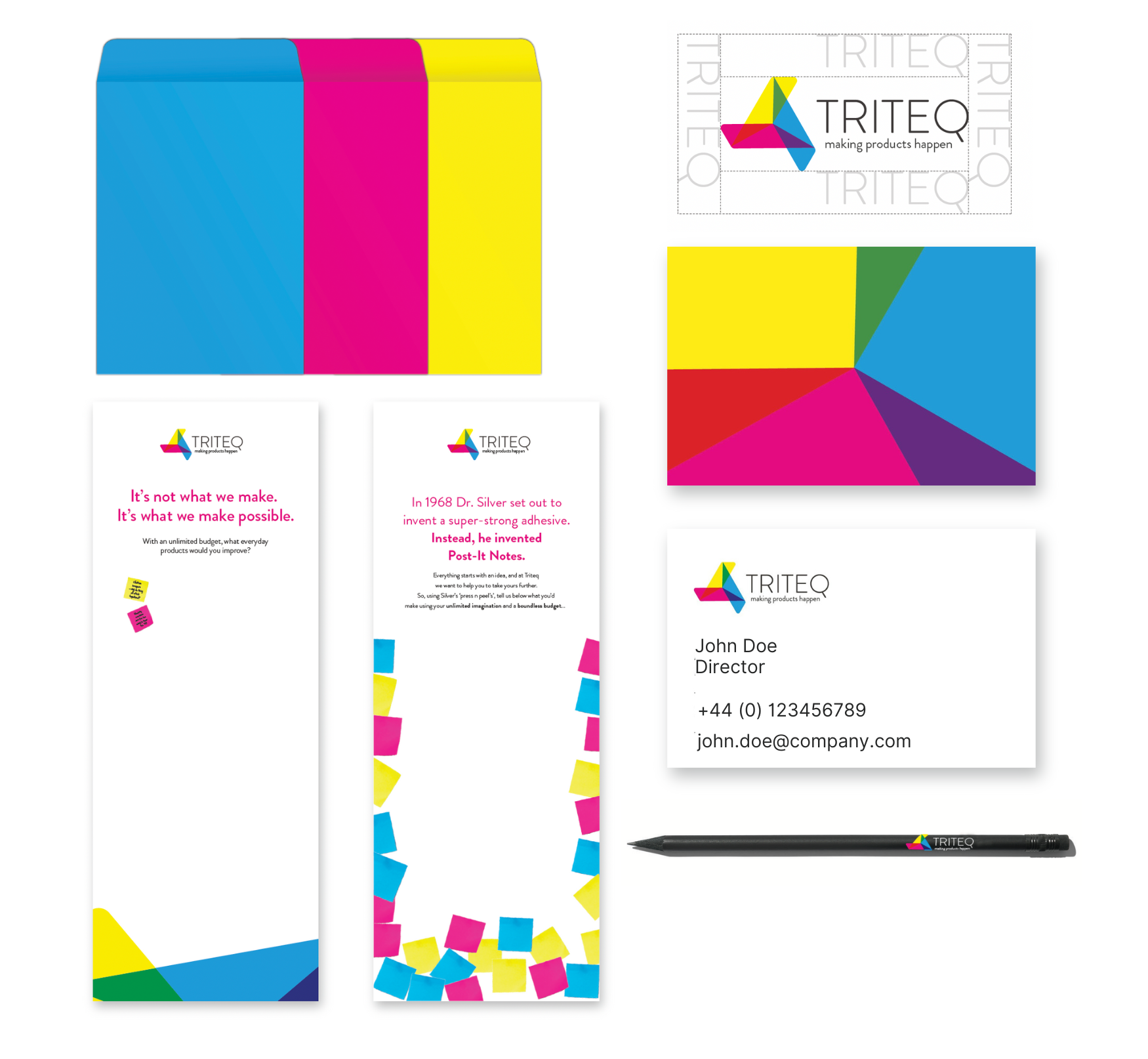 A set of colorful business cards , envelopes , bookmarks , and a pen.