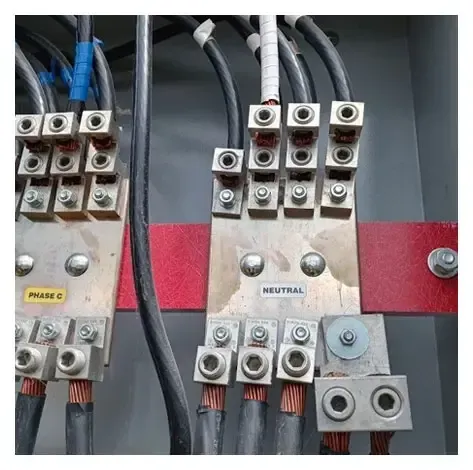 A close up of a electrical panel with a lot of wires connected to it.