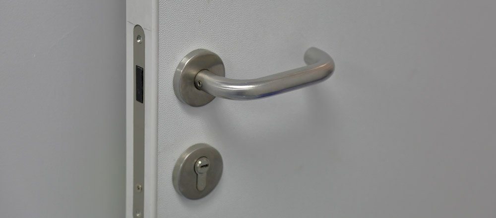 How do you safely change the locks on your doors?
