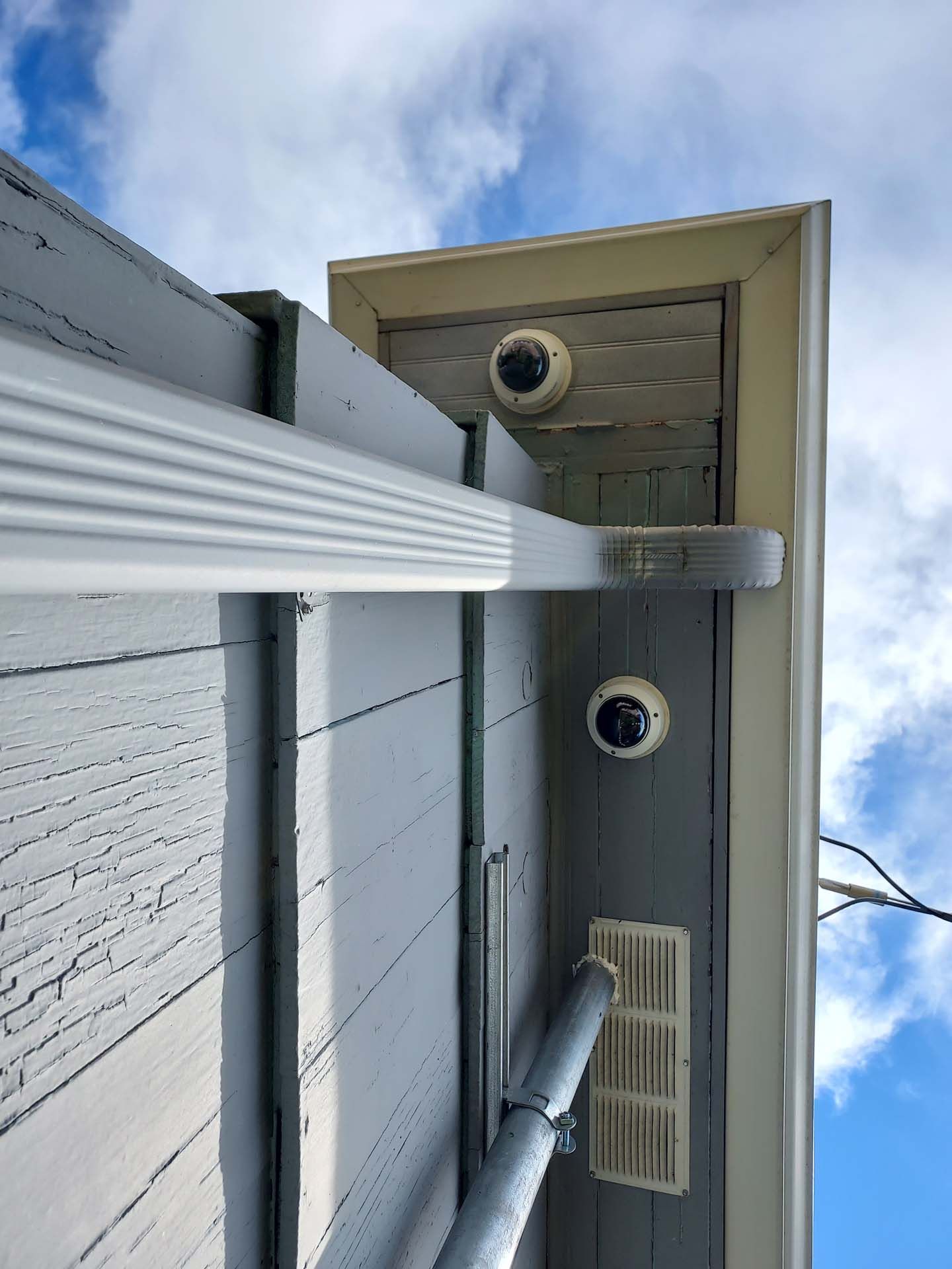 A close up of a building with a blue sky in the background