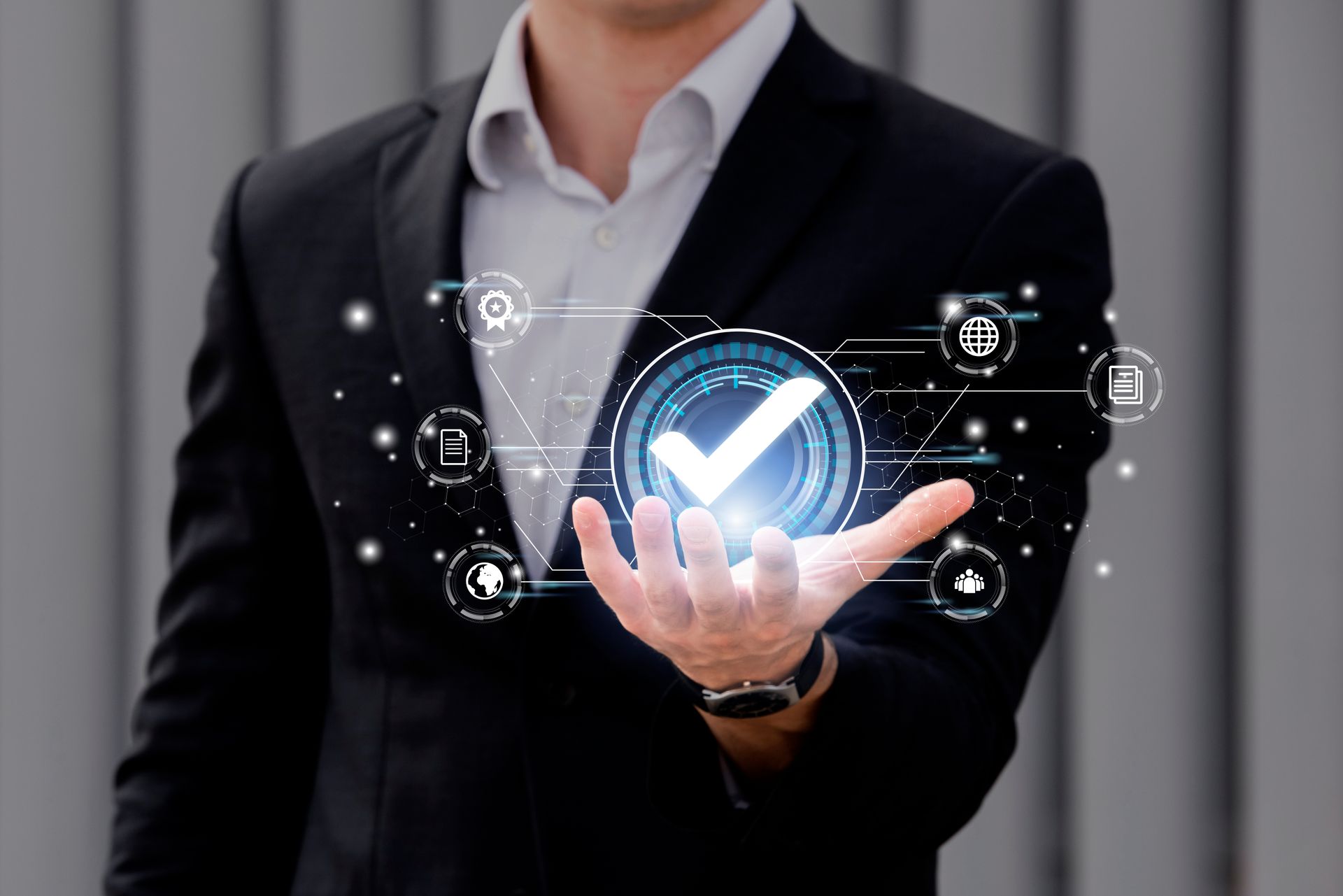 A man in a suit is holding a check mark in his hand.